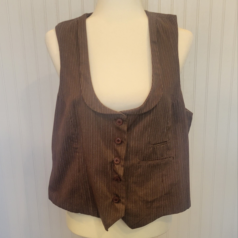 Maurices size xl button up vest with a scooped collar neck and sinched in back